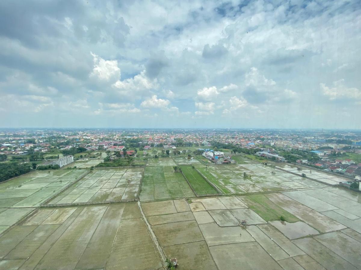 Hozby Skyview Setiabudi Suites Sunggal Buitenkant foto